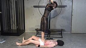 Japanese mistress puts clothespins on slaves nipples and cock