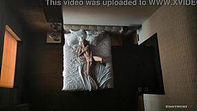 Hidden cam captures milf solo in bed