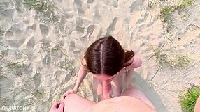 Sucking off my best friend at the public beach and taking cumshot on my pretty face