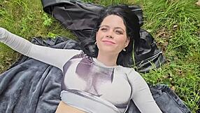 She is smoking on the grass and decides to show her boobs under the sun