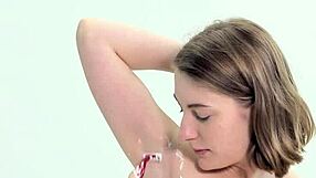 sweet teen girl shaving herself in the bathroom