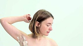 sweet teen girl shaving herself in the bathroom