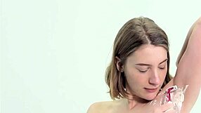 sweet teen girl shaving herself in the bathroom