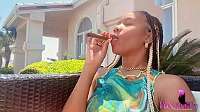 Smoker beauty Jenna Foxx rubs her horny trimmed pussy outdoors