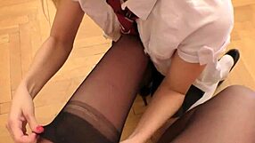 Mature woman in stockings passionately licks teen lesbian in uniform