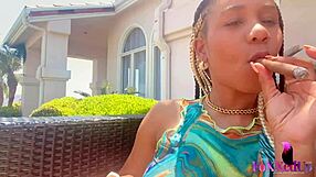 Smoker beauty Jenna Foxx rubs her horny trimmed pussy outdoors