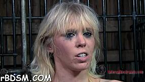 restrained bondman receives lusty castigation for her naughty twat