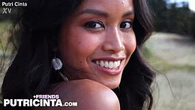 She says, 'Play with my nipples,' as horny asian slut Putri Cinta teases in golden fields.