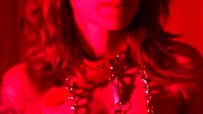 redhead milf engages in bdsm pussy fucking and ass fingering solo. toys and latex add to the fetish play.