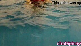 flashing balloons in the public swimming pool. lots of fun with friends outdoors.