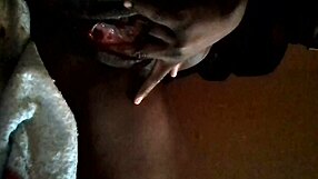 She plays with her wet pussy in an intimate moment.