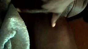 She plays with her wet pussy in an intimate moment.