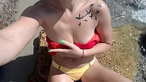 hot blonde girl masturbates publicly playing with pussy on beach