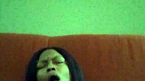 Black ebony woman with hairy pussy makes herself creamy by rubbing intensely.