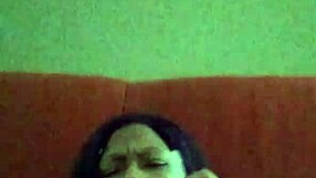 Black ebony woman with hairy pussy makes herself creamy by rubbing intensely.