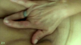 my 58 year old friend is masturbating and i am filming her