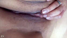 my 58 year old friend is masturbating and i am filming her