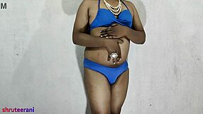 She says, watch me crossdress in this blue bikini, part 2
