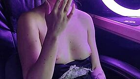 A beautiful lady smokes a cigarette