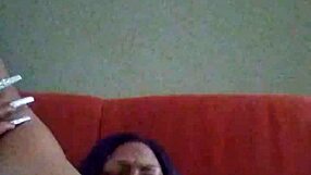 Black ebony woman with hairy pussy makes herself creamy by rubbing intensely.