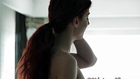 Gorgeous redhead's shaved pussy gets fucked.