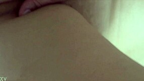 my 58 year old friend is masturbating and i am filming her