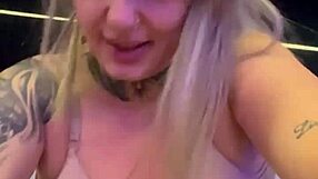 Woman in gym sweats shows wet pussy