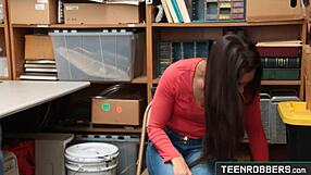 Is Lilly Hall, the cute shy teen shoplifter, getting hard doggystyle punishment from the robber?