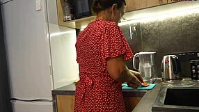 Hubby films his mature wife in the kitchen