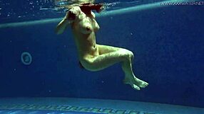 Lina Mercury Models Red Lingerie Underwater in Pool