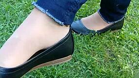 intense shoeplay and toe dipping with tan nylons and flats on the floor