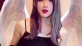 Cute Ladyboy Masturbates While Streaming On Camera