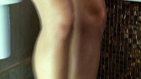 Wife performs striptease while husband bathes in bathroom