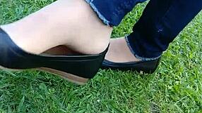 intense shoeplay and toe dipping with tan nylons and flats on the floor