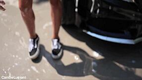 Young amateurs washing Mercedes car outdoors with natural beauty