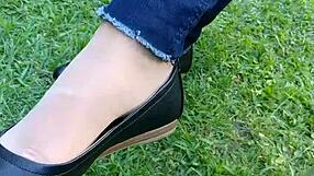 intense shoeplay and toe dipping with tan nylons and flats on the floor