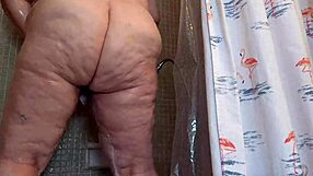 Chubby SSBBW woman showering and flashing natural tits