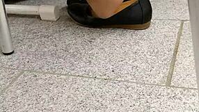 intense shoeplay and toe dipping with tan nylons and flats on the floor