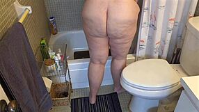Chubby SSBBW woman showering and flashing natural tits