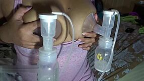 Milf's big lactating tits pumped hard and milked