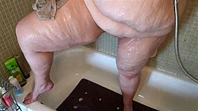 Chubby SSBBW woman showering and flashing natural tits