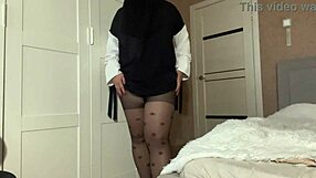 Stepmom in hijab shows pantyhose to her stepson.