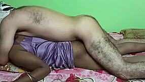 mature indian housewife lying on bed wearing a nightdress and her boy friend doing sex from the back side with his hairy naked body