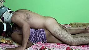 mature indian housewife lying on bed wearing a nightdress and her boy friend doing sex from the back side with his hairy naked body