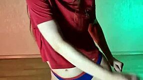 Young girl practices hip hop moves in panties at home