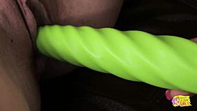 A naughty lesbian girl licks her friend's shaved pussy on the couch