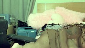 slowly undressing in front of the camera for a teasing striptease