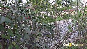 Pretty Girl Pees in Nature Outdoors