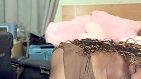 slowly undressing in front of the camera for a teasing striptease