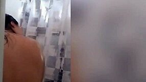 cute latina showering in the bathroom